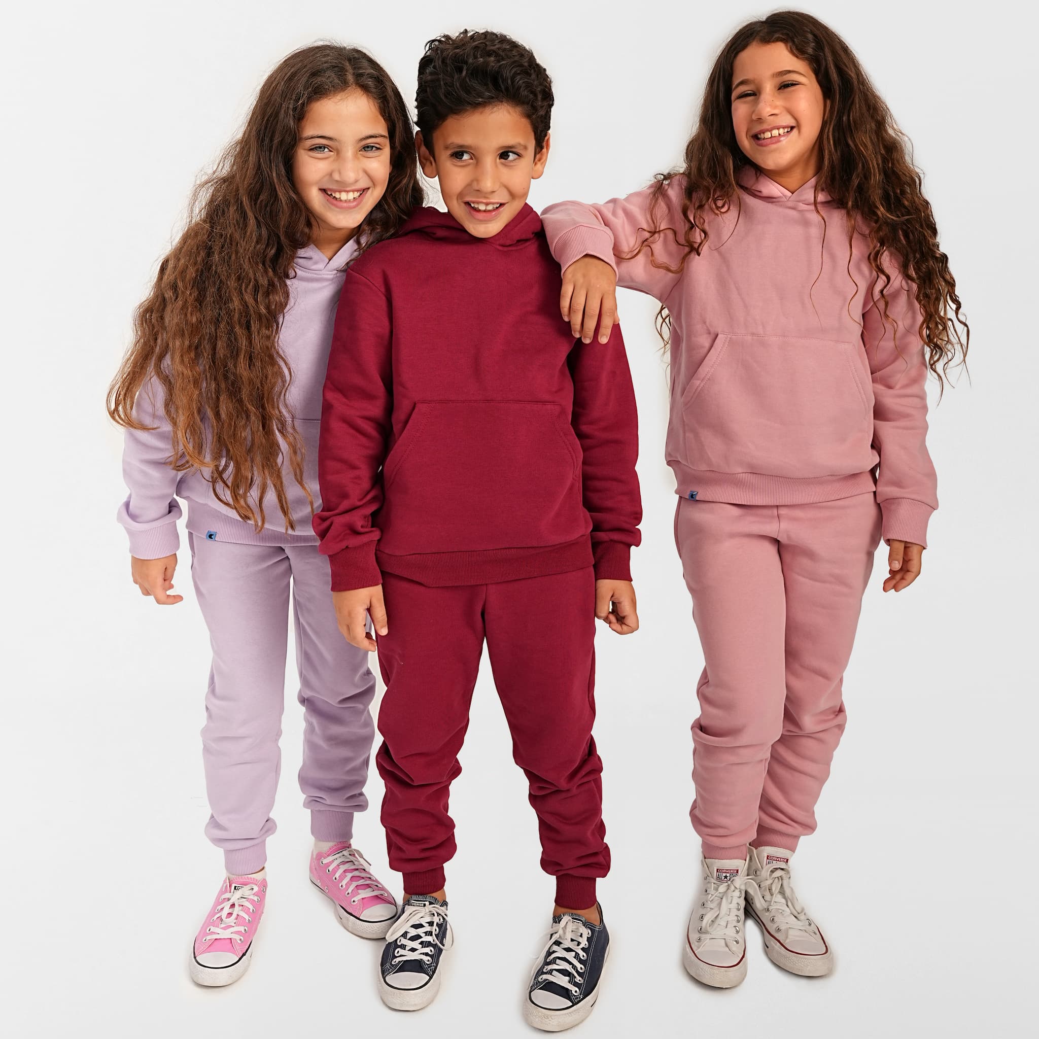 boy and girl wearing unisex combo